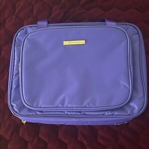 Purple makeup bag.